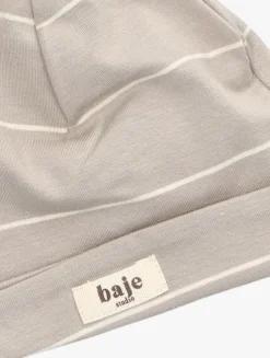 beige baje studio muts yuca