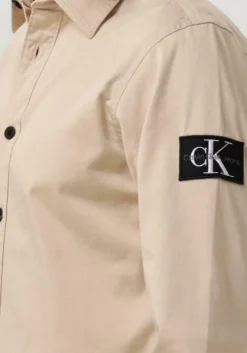 beige calvin klein overshirt monologo badge relaxed shirt