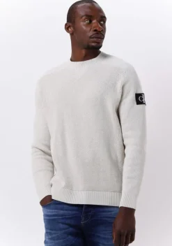 beige calvin klein sweater monologo badge sweater