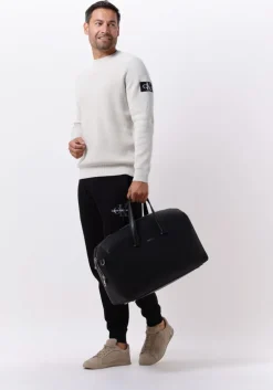 beige calvin klein sweater monologo badge sweater