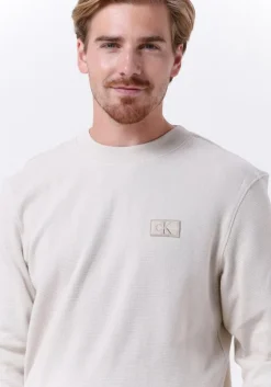 beige calvin klein trui shrunken badge ls waffle tee