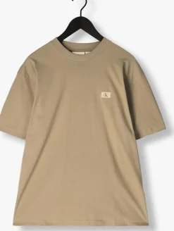 beige calvin klein t-shirt woven label relaxed tee