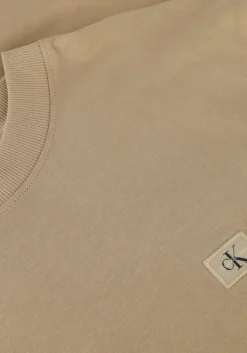 beige calvin klein t-shirt woven label relaxed tee