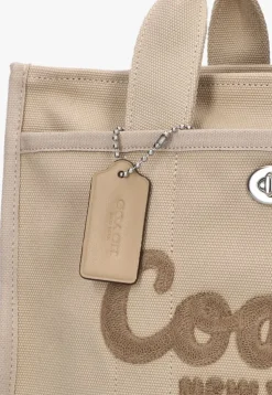 beige coach handtas cargo tote