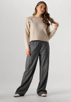 beige co'couture trui the row officer rib knit