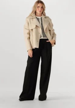 beige janice trenchcoats jean