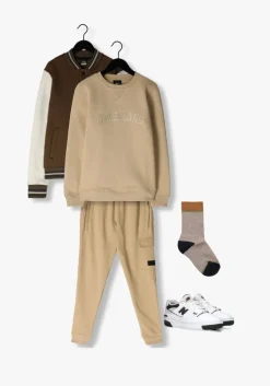 beige malelions sweater paint sweater