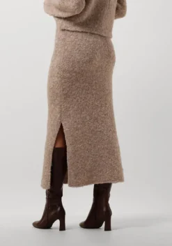 beige moves midirok bistina