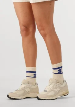 beige new balance lage sneakers m2002 d