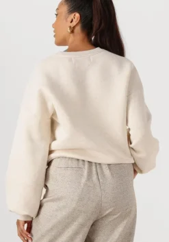 beige nukus sweater muse pullover