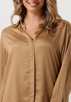 beige omoda atelier blouses x kae