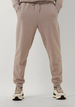 beige tommy jeans joggingbroek tjm reg signature sweatpants