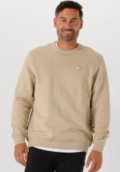 beige tommy jeans sweater tjm reg badge crew ext