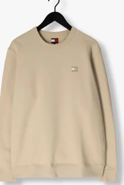 beige tommy jeans sweater tjm reg badge crew ext
