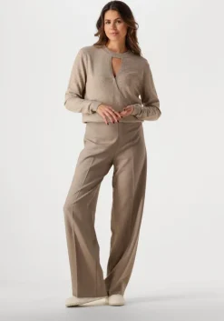 beige vanilia trui peekhole wrap sweater