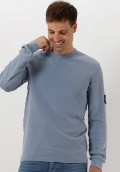 blauwe calvin klein trui washed badge waffle