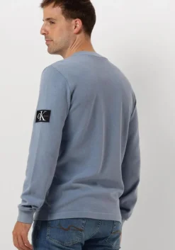 blauwe calvin klein trui washed badge waffle