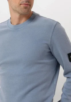 blauwe calvin klein trui washed badge waffle