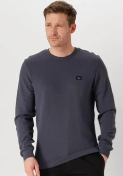 blauwe calvin klein trui woven label waffle ls tee