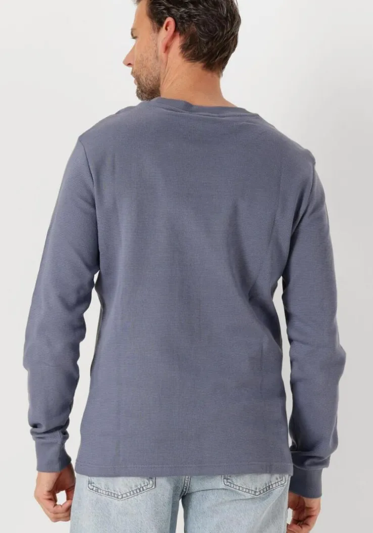 blauwe calvin klein trui woven label waffle ls tee