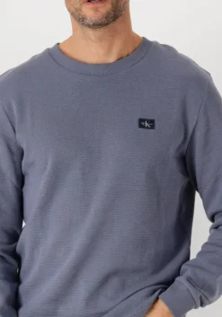 blauwe calvin klein trui woven label waffle ls tee