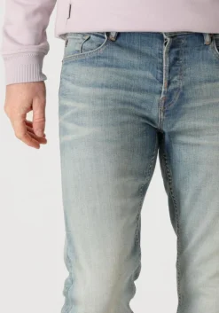 blauwe cast iron tapered jeans shiftback tapered desert sand finish