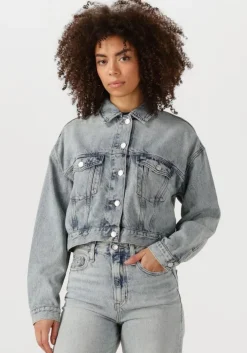 blauwe tommy jeans spijkerjas ovsz crop trucker jacket bi6012