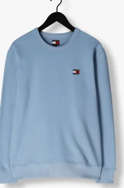 blauwe tommy jeans sweater tjm reg badge crew ext