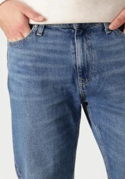 blauwe tommy jeans tapered jeans dad jeans rglr tprd cho130