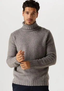 bruine dstrezzed coltrui ove turtleneck