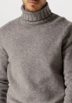 bruine dstrezzed coltrui ove turtleneck