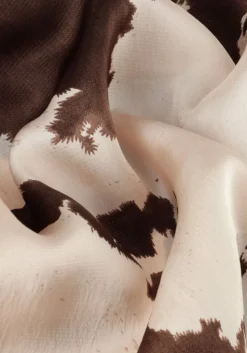 bruine neo noir top lindy cow print top