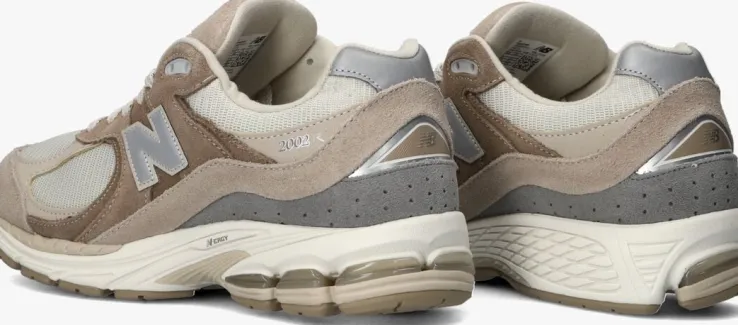 bruine new balance lage sneakers m2002r m