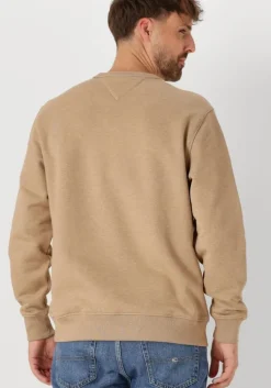 bruine tommy jeans trui tjm reg bagde crew ext