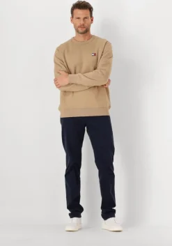 bruine tommy jeans trui tjm reg bagde crew ext