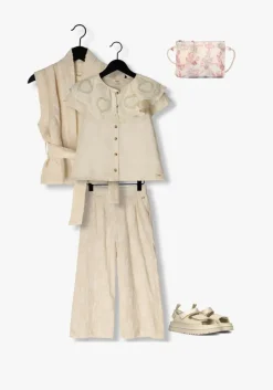 creme baje studio gilet ize