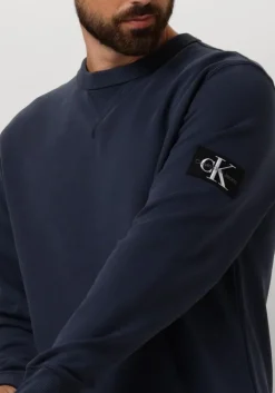 donkerblauwe calvin klein sweater badge crew neck