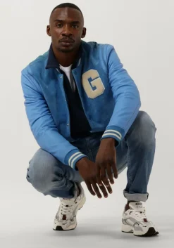 donkerblauwe tommy jeans trui tjm reg signature half zip