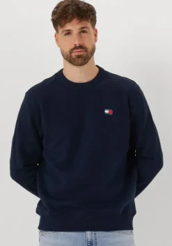 donkerblauwe tommy jeans trui tjm reg bagde crew ext