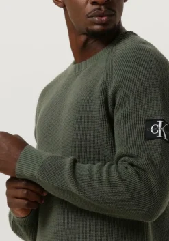 donkergroene calvin klein sweater badge easy sweater