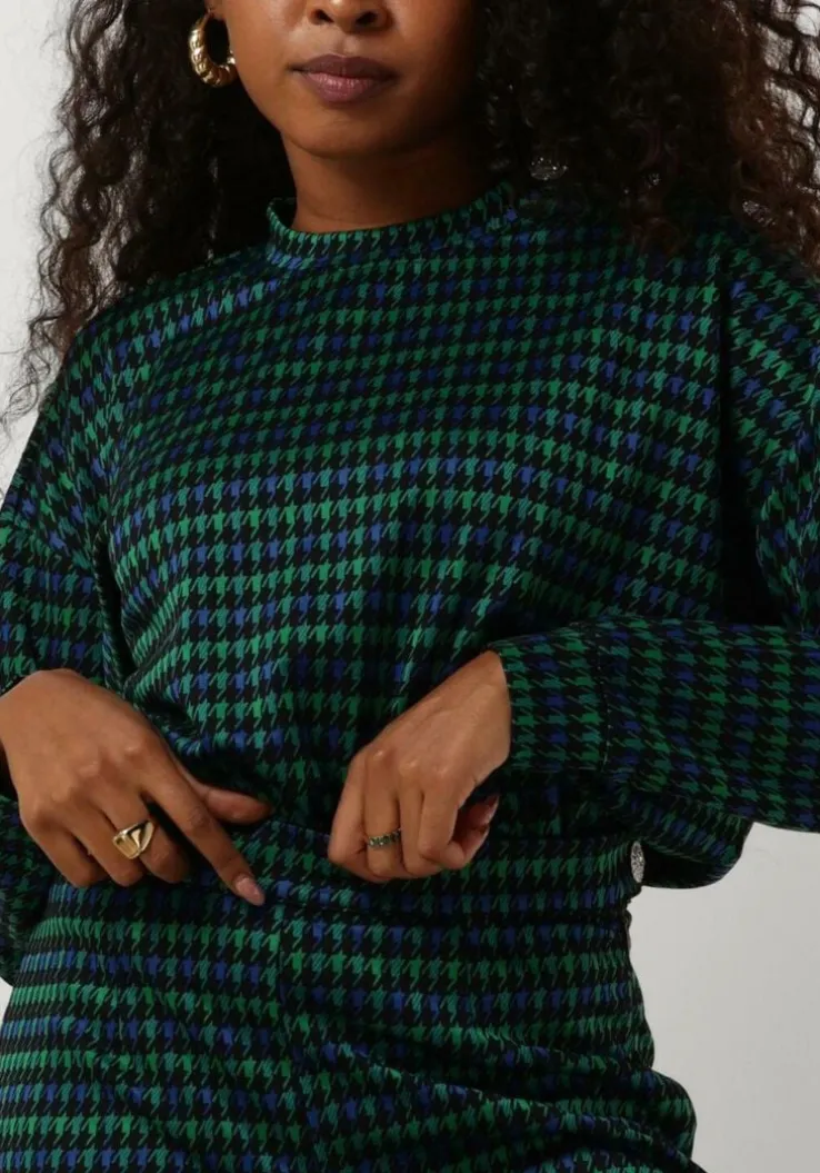 donkergroene lollys laundry top nayarit