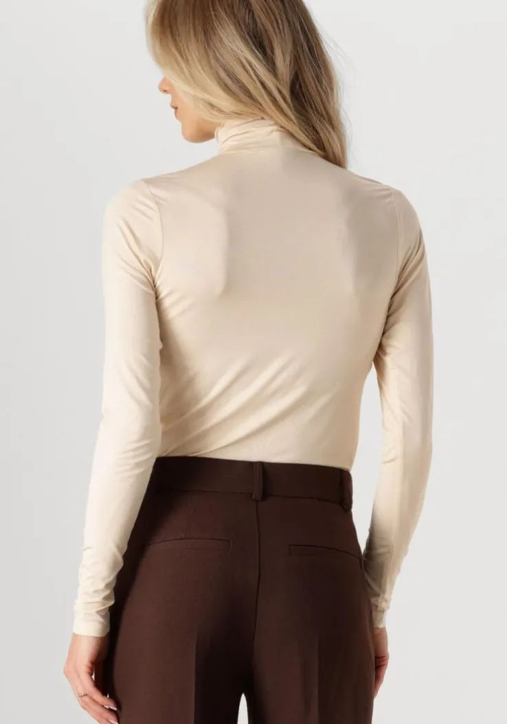 ecru cc heart coltrui cc heart sofia turtleneck blouse