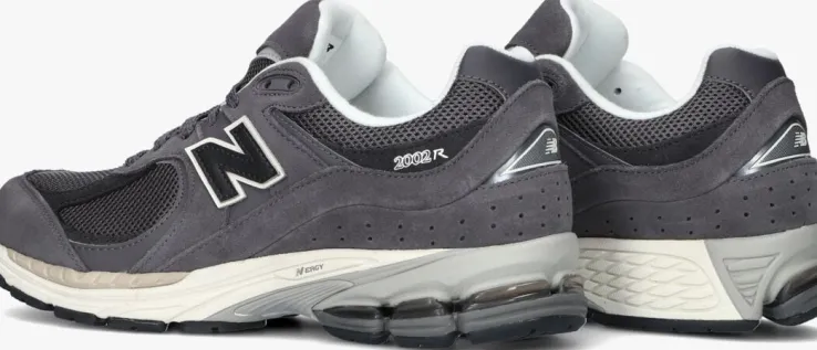 grijze new balance lage sneakers m2002 m