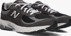 grijze new balance lage sneakers gc2002