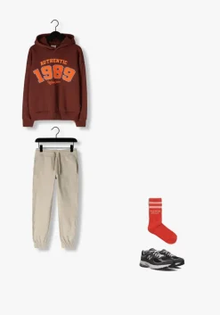 grijze new balance lage sneakers gc2002