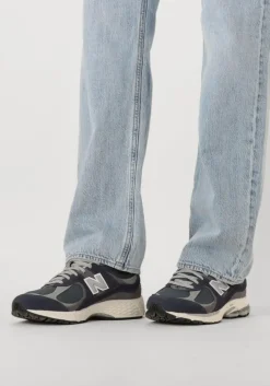 grijze new balance lage sneakers m2002r m