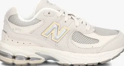 grijze new balance lage sneakers pc2002
