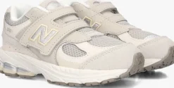 grijze new balance lage sneakers iv2002