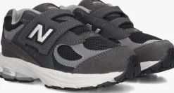 grijze new balance lage sneakers iv2002
