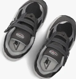 grijze new balance lage sneakers iv2002